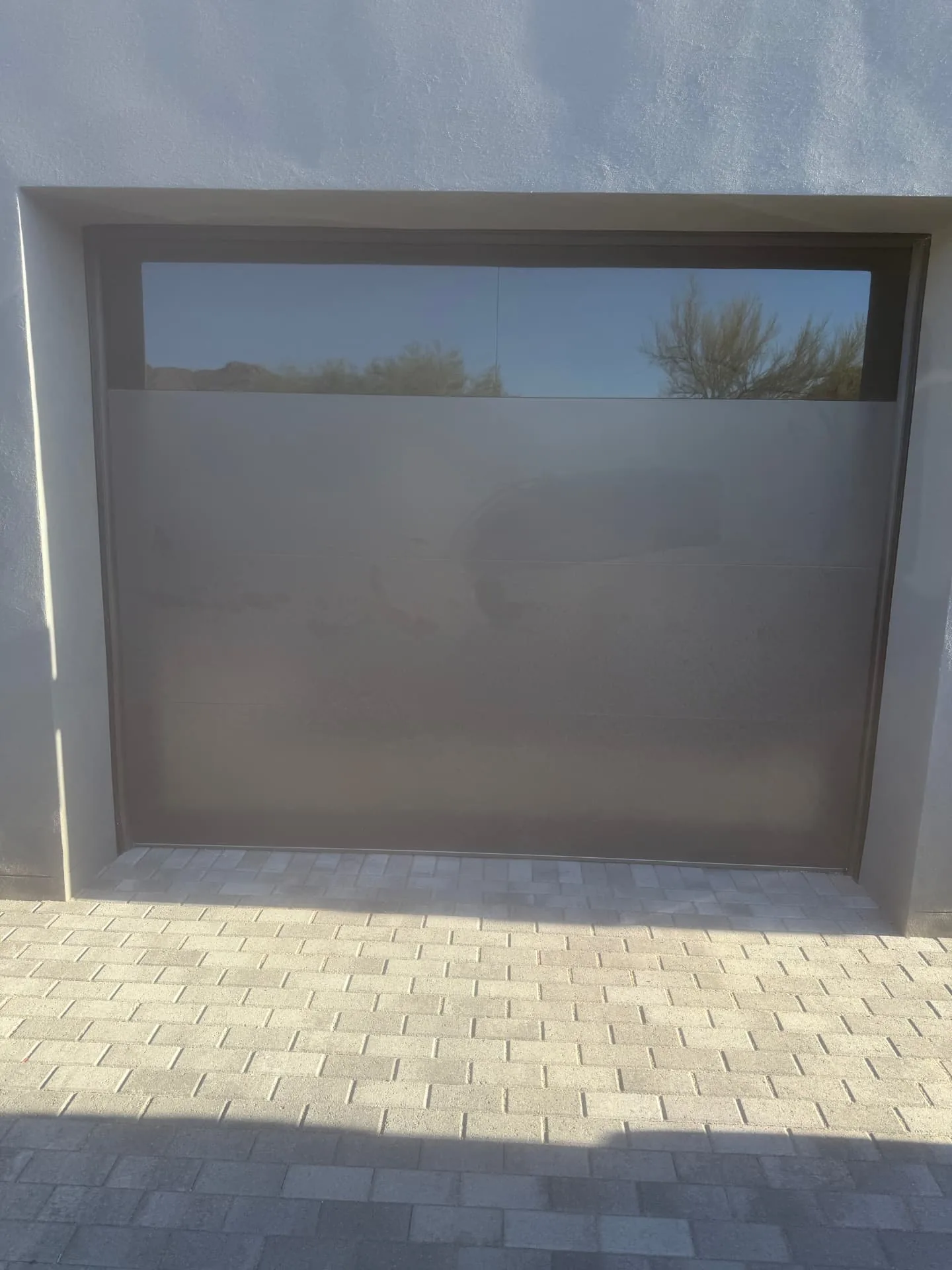 Jay Bigwood, owner of AZ Garage Door Pros LLC, on a job in the North Valley