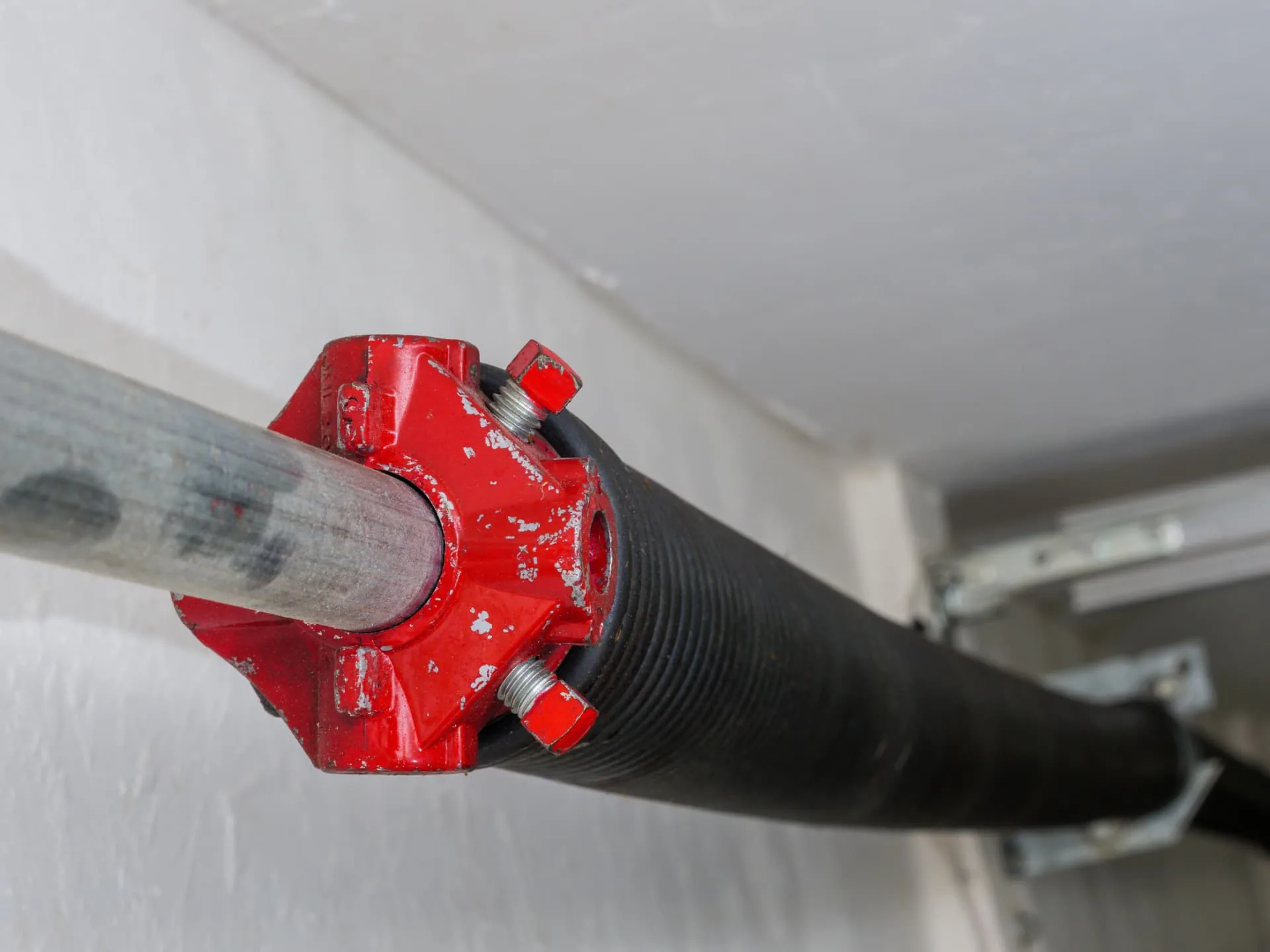 Garage door roller and track service in Scottsdale, AZ by AZ Garage Door Pros LLC