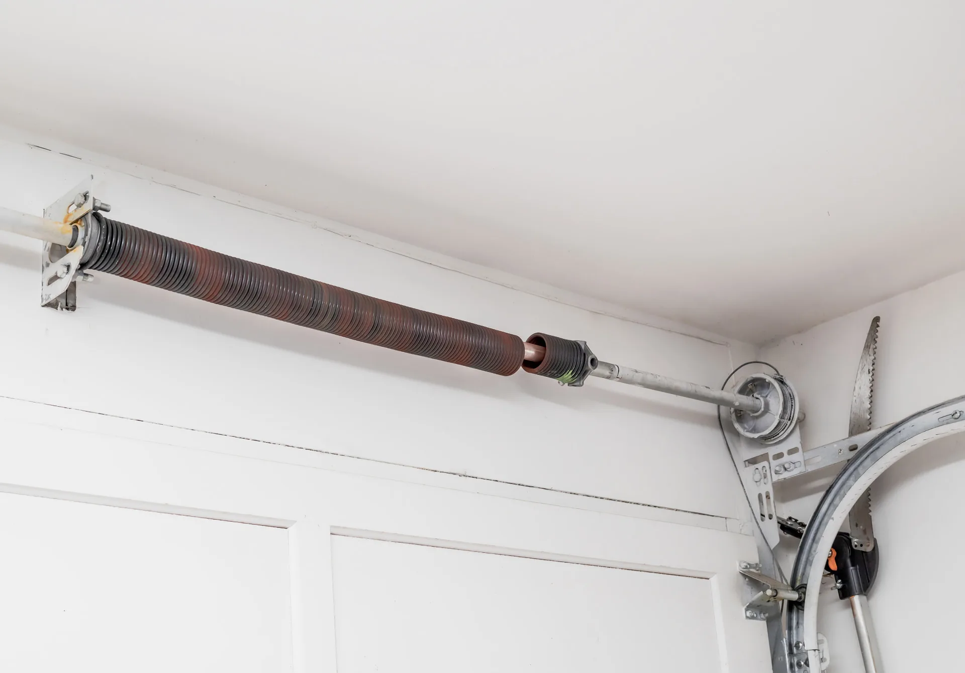 The Homeowner's Guide To Snapped Garage Door Springs: Torsion Vs. Extension Springs - garage door guide for North Valley homeowners in New River, AZ
